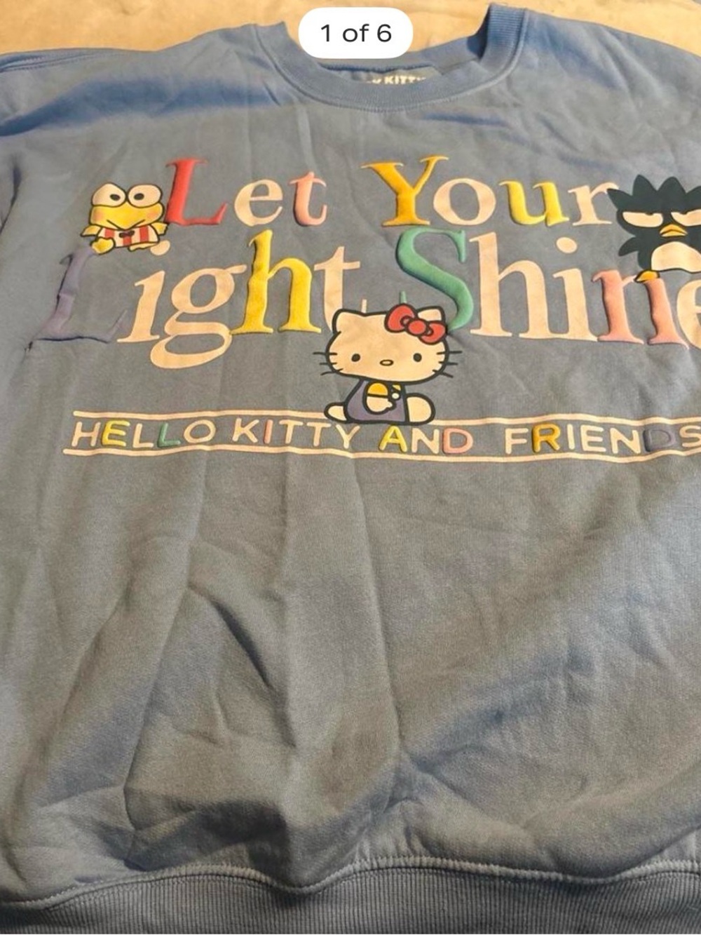 Sanrio Hello Kitty Light Blue 'Let Your Light Shine' Sweatshirt